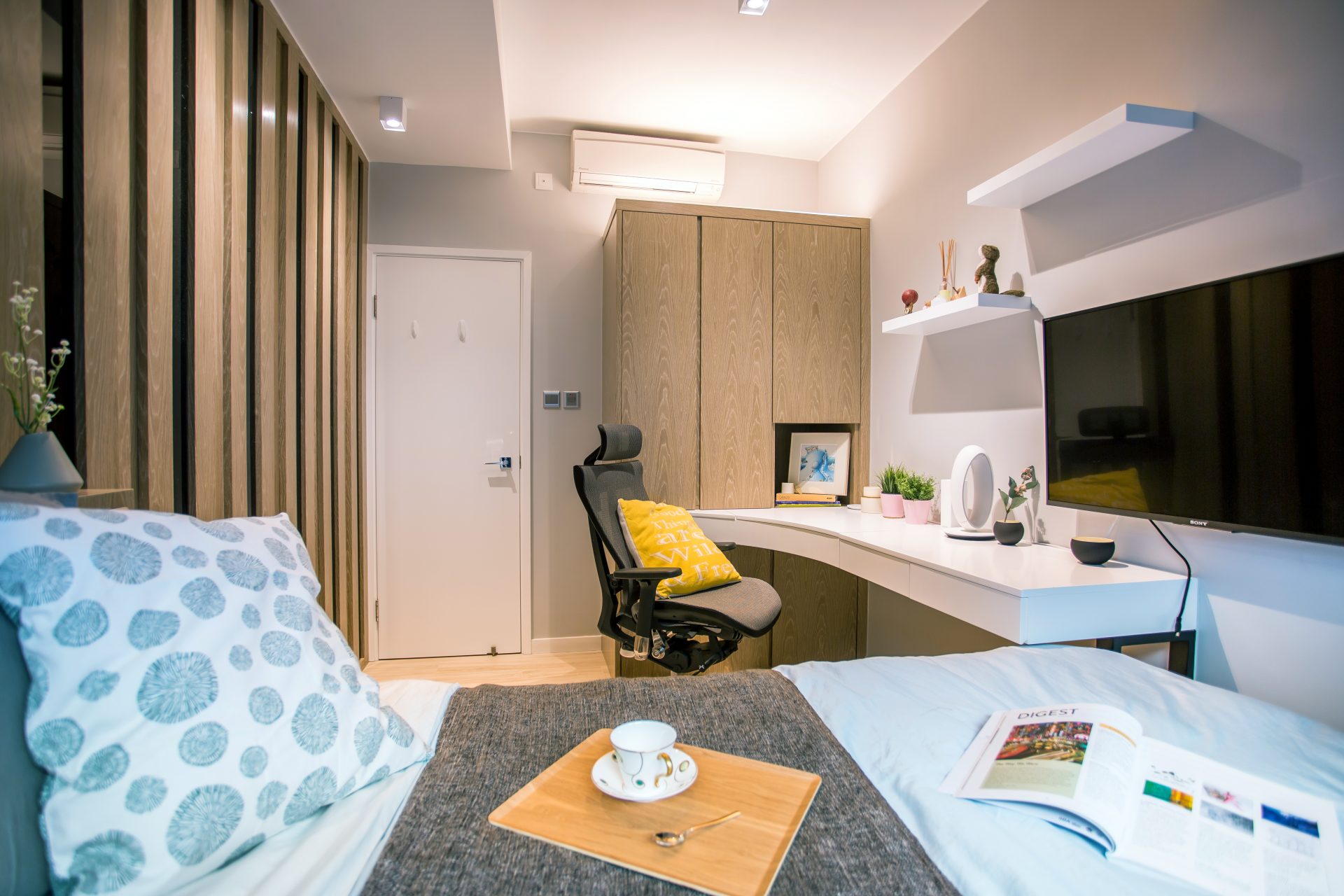 Bed, desk and work chair in the bedroom