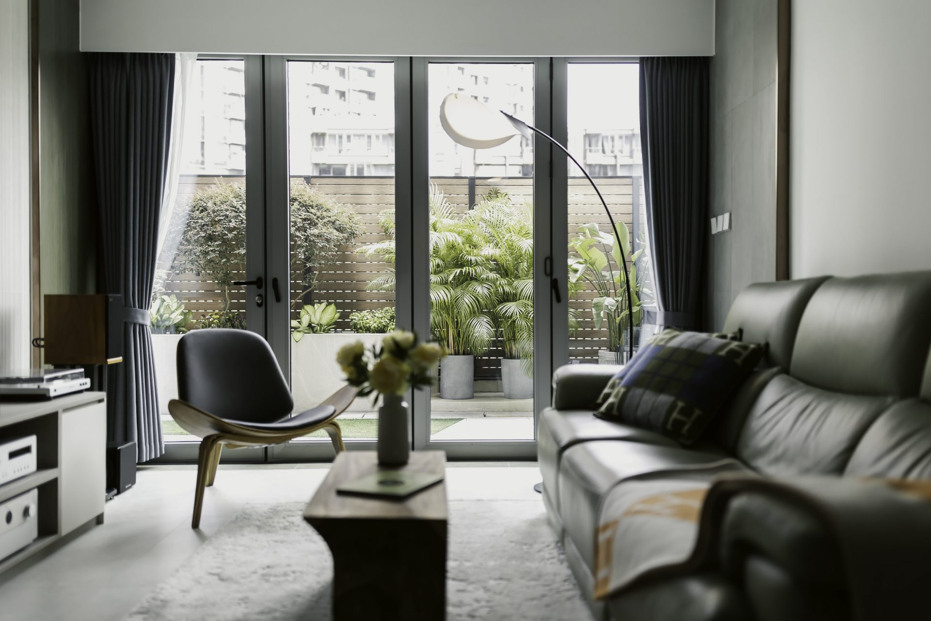 Grande Monaco | Living and dining room panorama, showing the sofa, TV cabinet and dining area