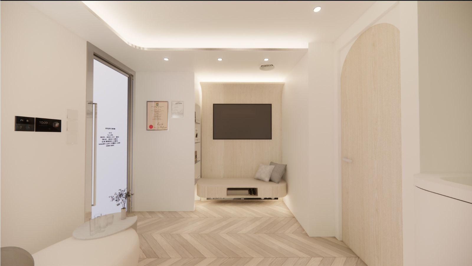 Dental clinic｜Seating area and TV wall at the end of the corridor